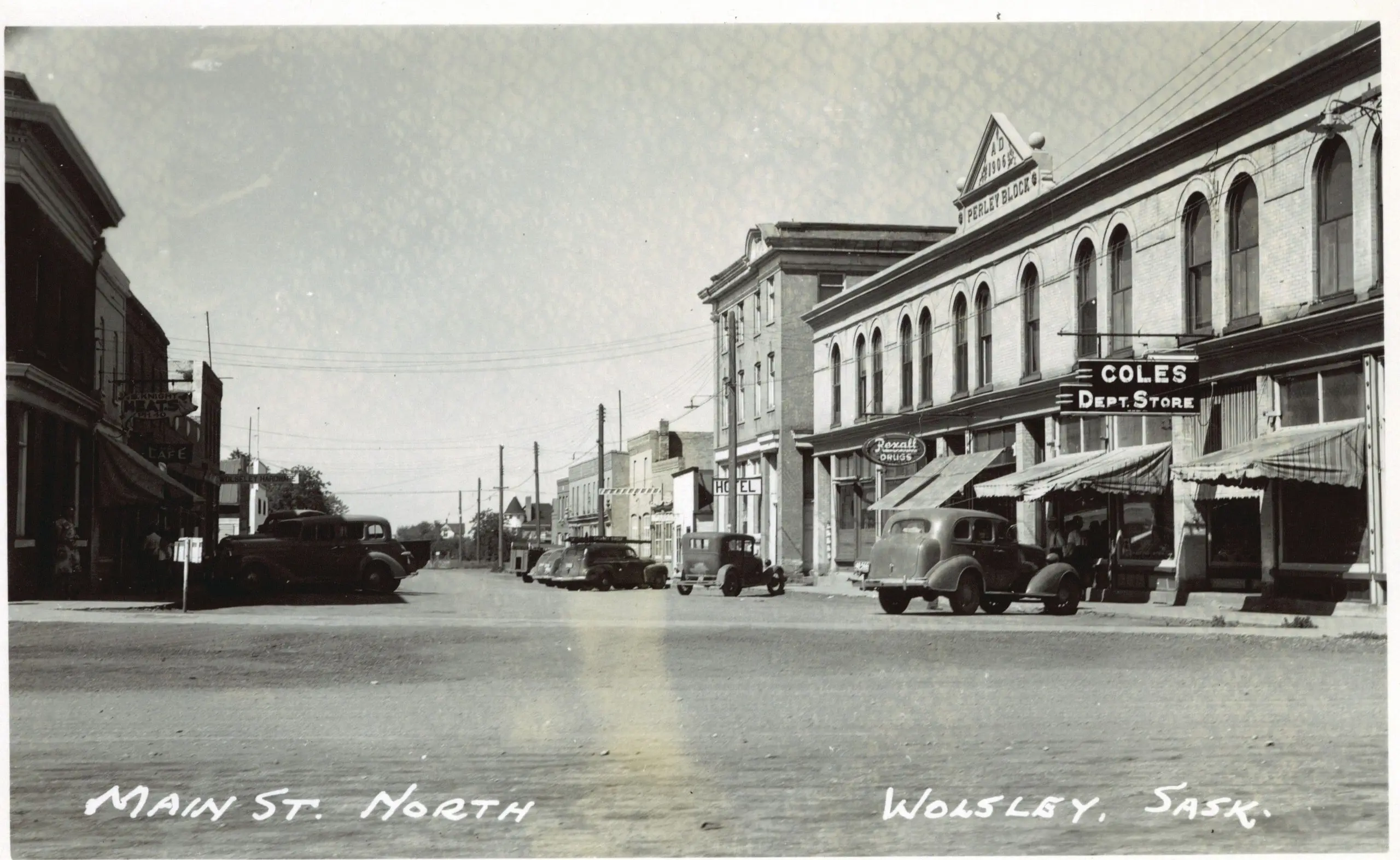 Main Street North with the Perley Block and Coles Dept. Store