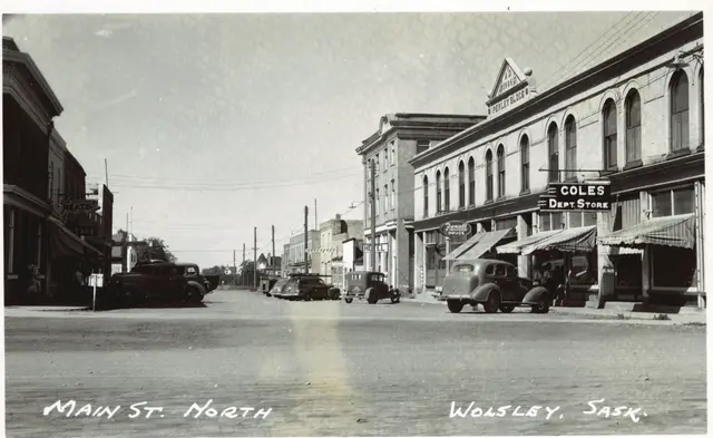 Main Street North with the Perley Block and Coles Dept. Store